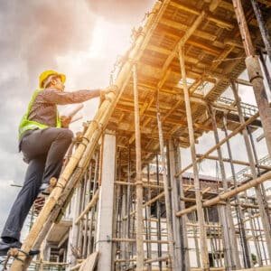 young professional engineer worker working ladder house building construction site
